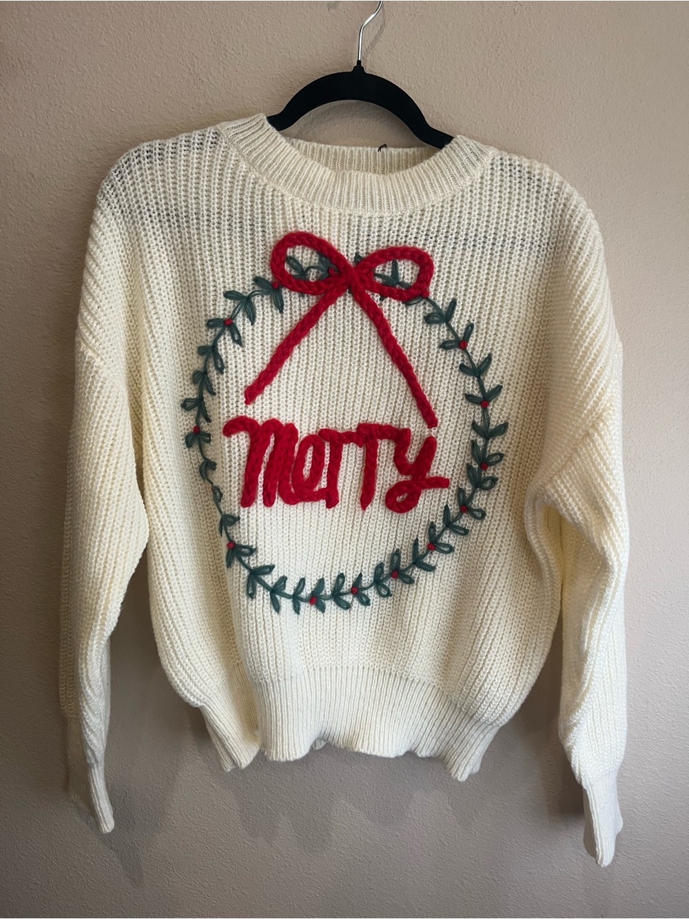 BiBi Cream Crewneck Sweater with Red 'Merry' Appliqué and Green Wreath Accent
